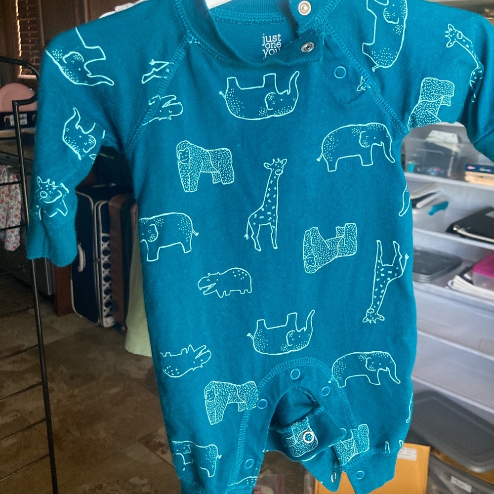 Newborn one piece with button fasteners